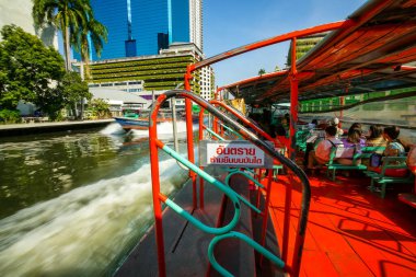 Bangkok, Thailand - January 19, 2025 : The atmosphere on both sides of the Saen Saep Canal, a canal where passenger boats take passengers into the center of Bangkok. clipart