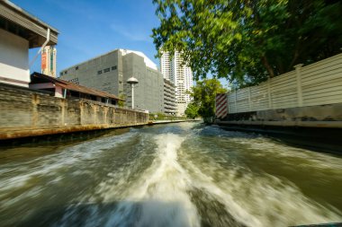 Bangkok, Thailand - January 19, 2025 : The atmosphere on both sides of the Saen Saep Canal, a canal where passenger boats take passengers into the center of Bangkok. clipart