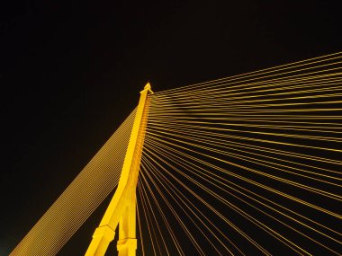 BANGKOK - High Resolution of Rama VIII Bridge Cable Light Reflection : Night scene of the Steel bridge pylon during the night in Bangkok, Thailand, under dark night sky, on February 5, 2023.