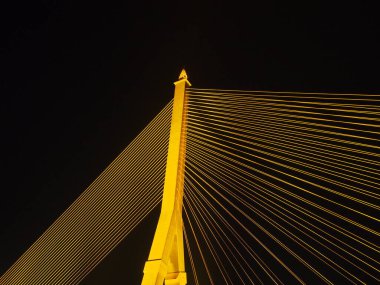 BANGKOK - High Resolution of Rama VIII Bridge Cable Light Reflection : Night scene of the Steel bridge pylon during the night in Bangkok, Thailand, under dark night sky, on February 5, 2023.