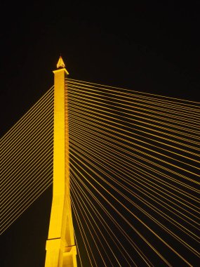 BANGKOK - High Resolution of Rama VIII Bridge Cable Light Reflection : Night scene of the Steel bridge pylon during the night in Bangkok, Thailand, under dark night sky, on February 5, 2023.