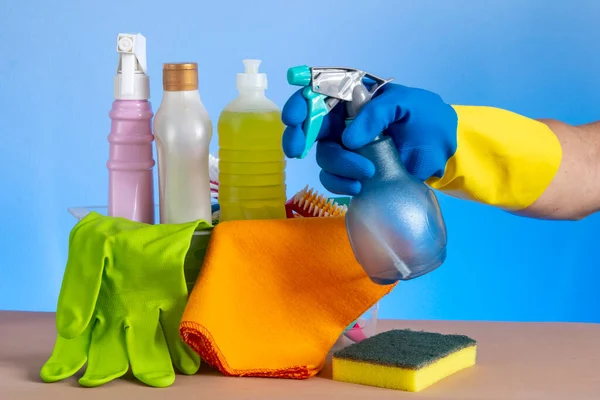 stock image basket with cleaning products for home hygiene use with plastic packaging