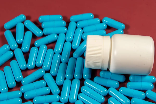 Blue Medicine Capsules White Bottle Symbolizing Medicine — Stock Photo, Image