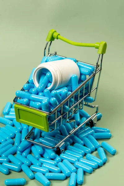 Blue Medicine Capsule Miniature Shopping Cart Symbolize Medicine Purchase — Stock Photo, Image