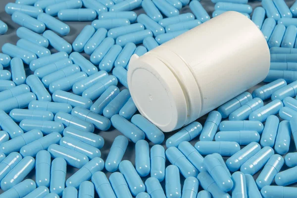 Blue Antibiotic Capsule Pills Texture White Bottle Pharmaceutical Production Global — Stock Photo, Image