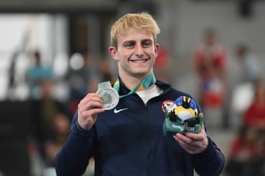 Santiago, Şili, 25 Ekim 2023, Curran Phillips (ABD) gold, Cold Walker (ABD) silver and e Isaac Nunez (MEX) bronz Men Parallel Bars at the 2023 Pan American Games