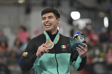 Santiago, Şili, 25 Ekim 2023, Curran Phillips (ABD) gold, Cold Walker (ABD) silver and e Isaac Nunez (MEX) bronz Men Parallel Bars at the 2023 Pan American Games