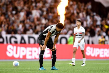 Rio, Brezilya, 8 Aralık 2024 - Brezilya Şampiyonası 'nda Botafogo ile Sao Paulo arasında oynanan maçta Adryelson oyuncusu, Nilton Santos Stadyumu' nda 36.