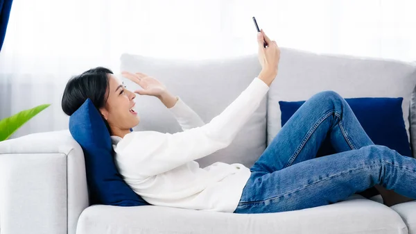 Happy Young Asian Woman Relaxing Home Female Smile Lying Sofa — 스톡 사진