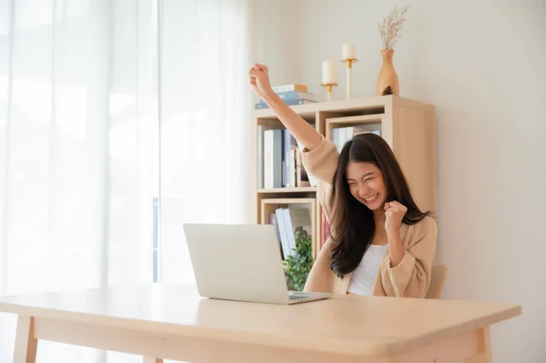Happy Euphoric Young Asian Woman Celebrating Winning Getting Ecommerce Shopping Royalty Free Stock Images