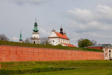 16th century renaissance Cathedral of the Resurrection and St. Thomas the Apostle known as Zamosc Cathedral and boroque bell tower, Zamosc, Poland
