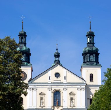 Kalwaria Zebrzydowska, Poland - August 18, 2022: Facade of 17th century Basilica of Our Lady of the Angels. It it famous famous place of pilgrimage called Polish Jerusalem