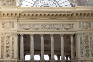 Naples, Italy - June 27, 2021: 19th century Galleria Umberto I renaissance shopping arcade with a steel and glass roof. It is a public shopping gallery