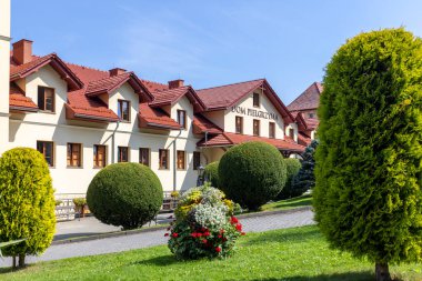 Kalwaria Zebrzydowska, Poland - August 18, 2022: Courtyard in front of Pilgrim's House and 17th century Passion and Marian sanctuary