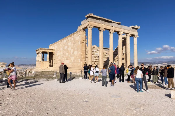 stock image Athens, Greece - October 17, 2022: Group of tourists in front of  Erechtheion, Temple of Athena Polias on Acropolis of Athens