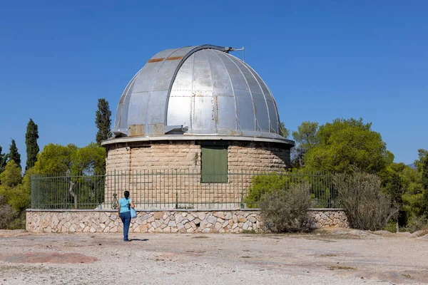 stock image Athens, Greece - October 17, 2022: Old Observatory on Mouseion Hill, building where famous Dorides telescope is located