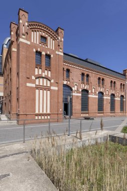 Lodz, Polonya - 4 Mayıs 2023: EC1 Lodz, Kültür Şehri, iş, bilim, ticaret ve kültür merkezi şehrin eski ilk elektrik santralinde yer almaktadır. Yeni Merkez, Lodz Fabryczna Tren İstasyonu 'nun yanında.