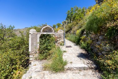 Gate of Saracens (Porta dei Saraceni) on the path of Saracens (Sentiero dei Saraceni) between Taormina and Castelmola, along the slope of Monte Tauro, Sicily; Italy clipart