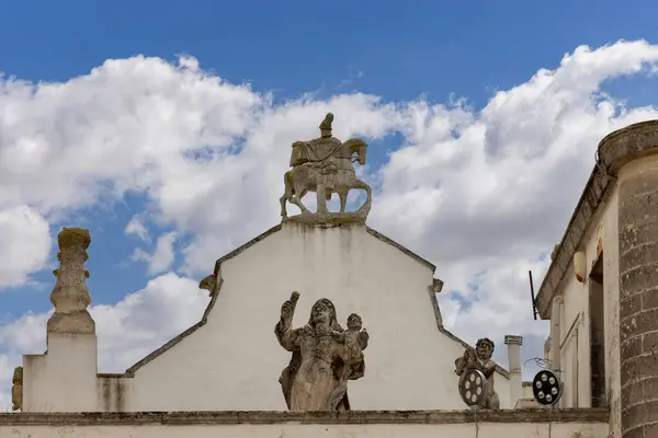 stock image Martina Franca, Italy, Puglia - May 25, 2024: Top of medieval St. Stephen's Gate (Porta di Santo Stefano), baroque gate to old Town. It is located between Piazza XX Settembre and Piazza Roma