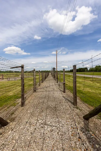 stock image Majdanek; Lublin; Poland - May 24, 2022: Majdanek concentration and extermination camp ( Konzentrationslager Lublin), barbed wire fence. It was a Nazi camp built by the SS 