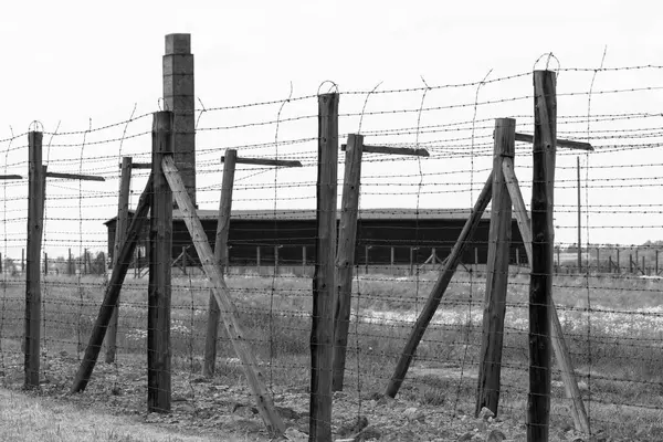 Stock image Majdanek; Lublin; Poland - May 24, 2022: Majdanek concentration and extermination camp ( Konzentrationslager Lublin), barbed wire fence. It was a Nazi camp built by the SS 