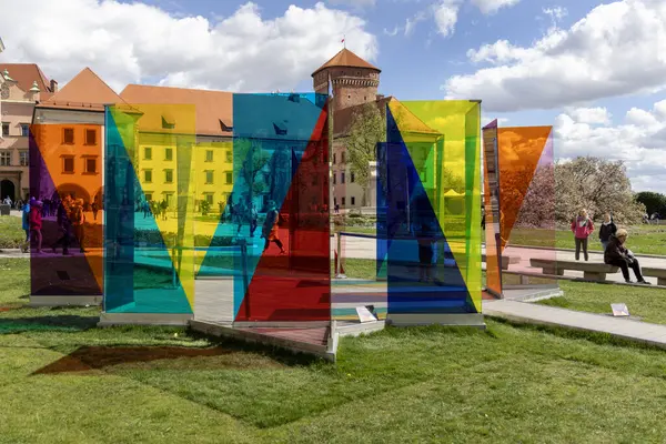 stock image Krakow, Poland - April 3, 2024 : Multi-colored glass panes, modern art installation titled 