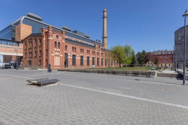 Lodz, Poland - May 4, 2023: EC1 Lodz, City of Culture, center of business, science, trade and culture located in old first power plant in city. New Center is next to Lodz Fabryczna Railway Station clipart