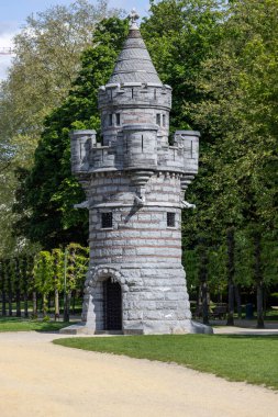 Brussels, Belgium - May 16, 2023: Tower of Tournai (Tour de Tournai) in Parc du Cinquantenaire ( Jubelpark) clipart