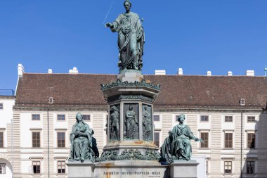 Vienna, Austria - April 26, 2024: Bronze monument to Emperor Franz I, located in the central courtyard of the Hofburg Palace clipart