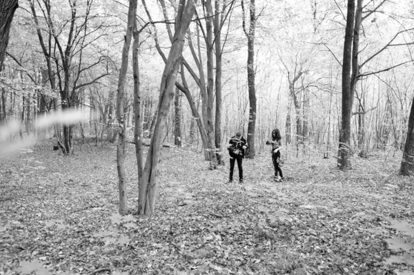 group of film crew people in the forest