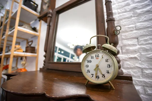 An vintage alarm clock that still works well.