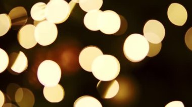 slow motion video of a defocused christmas lights