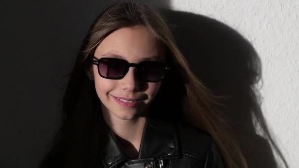 Slow Motion Video Stylish Child Leather Jacke Glasses Wind Blows — Vídeo de Stock