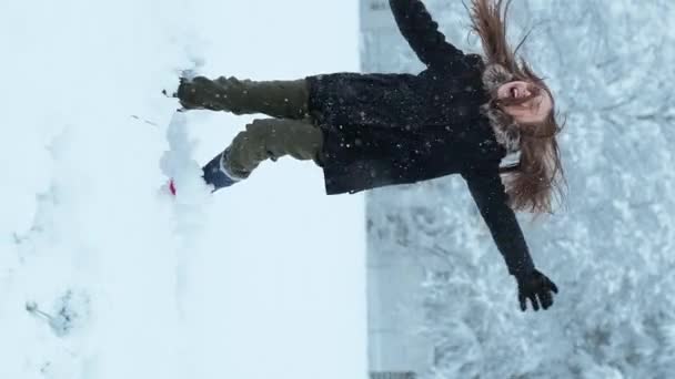 Happy Teenager Enjoying Snowfall Girl Spinning Snow Catching Snow — Stock Video