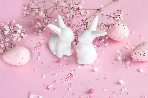 Easter background. Easter bunnies on a pink background. happy easter card. Easter. Flower
