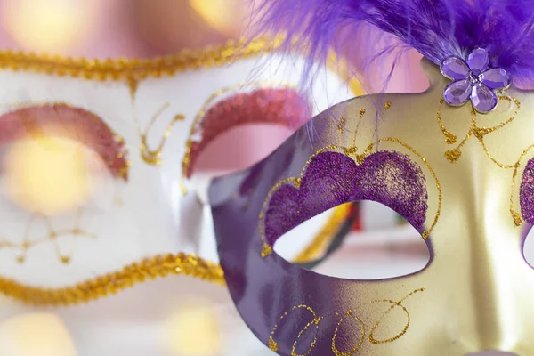 Festive face mask for carnival celebration. Mardi Gras carnival background with carnival mask. Carnival. bokeh.