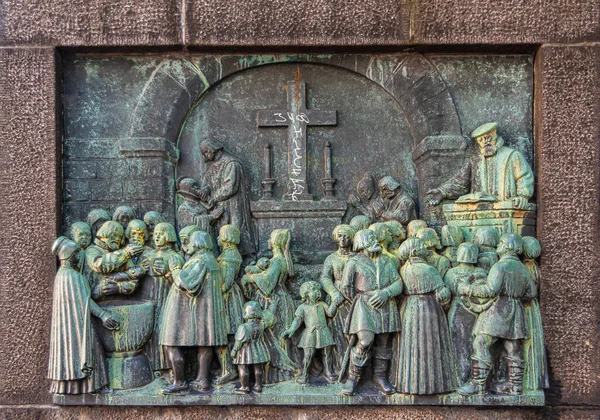 stock image Copenhagen, Denmark - September 13, 2010:   Peder Palladius his first service after the Reformation, on right side of Reformation Memorial obelisk at bispetorv square