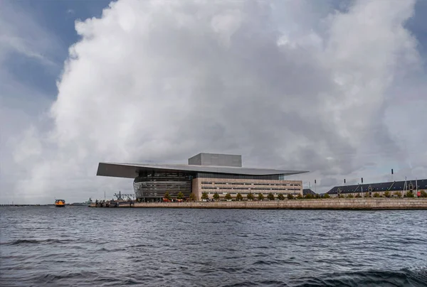 Stock image Copenhagen, Denmark - September 14, 2010: South and part of west facade of Royal Opera under blue cloudscape seen from Nyhavn