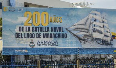 Cartagena, Colombia - July 25, 2023: Colorful Billboard in front of Naval Base ARC Bolivar picturing huge war sailing ship, remembering 200 year anniversary navy battle on Lago de Maracaibo clipart