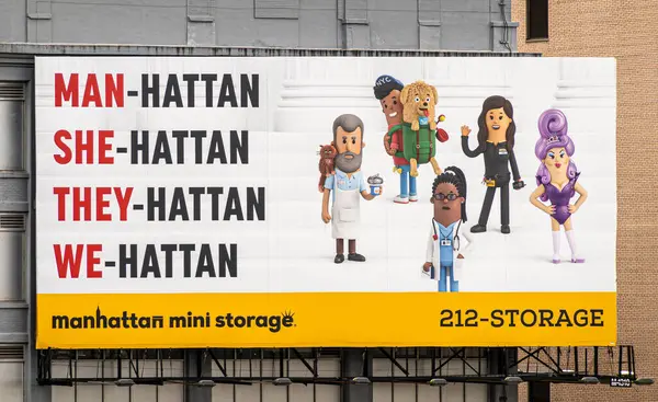 stock image New York, NY, USA - August 3, 2023: Manhattan Mini Storage building with large billboard featuring 5 cartoon characters on corner of W 44th street and 12th Ave