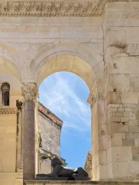 Split, Croatia - July 1, 2024: Historic downtown. Courtyard at Diocletian's Palace, original Egyptian granite Sphinx at the Peristyle clipart