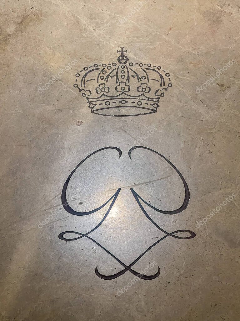 Principality of Monaco, France - July 9, 2024: Cathedral of Our Immaculate Lady. Etched logo for the Princes of Monaco on their tombstones.