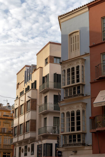 Malaga, Spain - October 26, 2022: Building facades in Malaga Spain on October 26, 2022