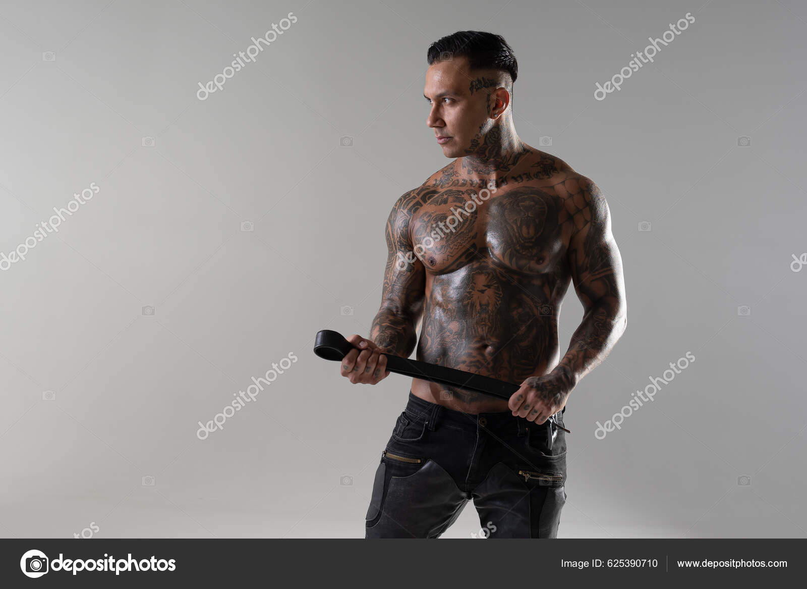 Muscular Shirtless Young Man Whip Mask Brutal Handsome Man Tattooed Stock  Photo by ©vikagrekova.vg@gmail.com 625390710