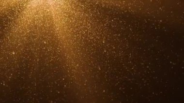 Turuncu ışık ışınları ve düşen parçacıkların soyut arkaplan döngüsü