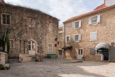 Ancient architecture in Poets Square in the old town of Budva, Montenegro