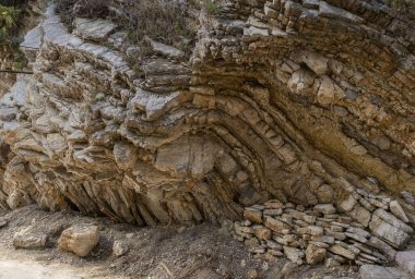 Layers of ancient rock formations in Budva, Montenegro