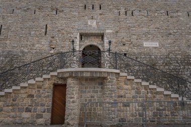 Ancient castle entrance in the old town of Budva, Montenegro