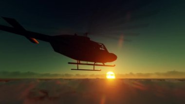 Helikopter gün batımının üzerinde uçuyor