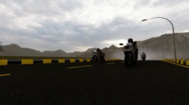 Virajdan çabucak çıkan motor yarışçıları